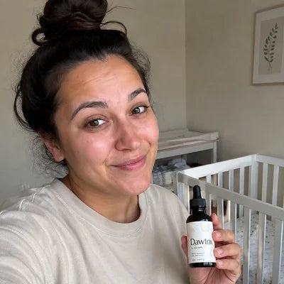 A customer holding a Dawtox bottle Image